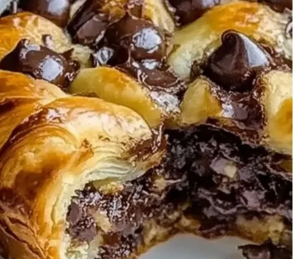 Delicious homemade chocolate croissant bake with flaky pastry and rich chocolate filling