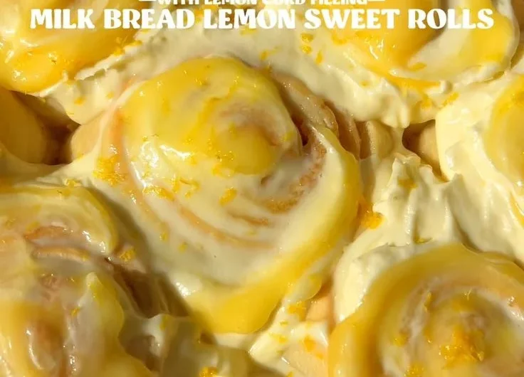 Delicious lemon rolls drizzled with glaze on a plate