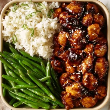 Delicious Asian High Protein Sesame Chicken served with vegetables