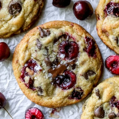Baking Cherry Chocolate Chip Cookies with cherries and chocolate chips.