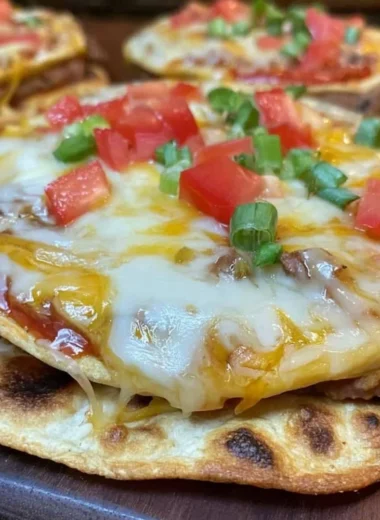 Homemade Taco Bell Mexican pizza served with toppings
