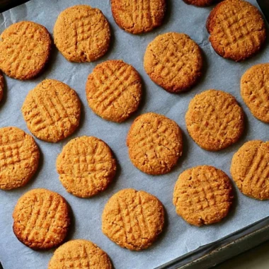 Gluten free and dairy free peanut butter cookies on a baking tray