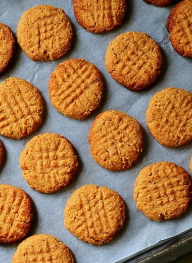 Gluten free and dairy free peanut butter cookies on a baking tray