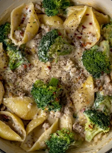 Plate of high protein pasta with turkey and broccoli