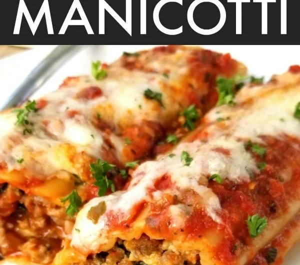 Delicious Italian sausage and cheese baked manicotti served on a plate
