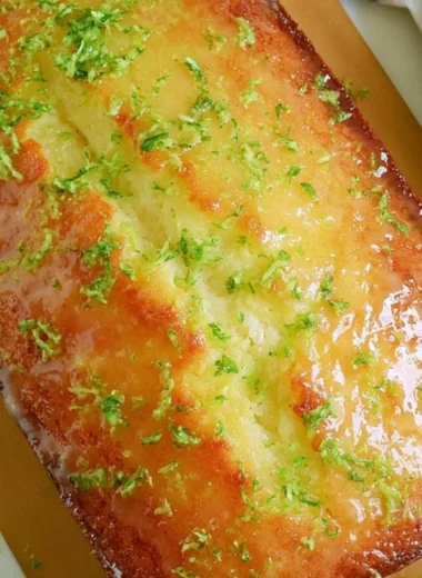 Delicious Key Lime Pound Cake served on a rustic wooden table