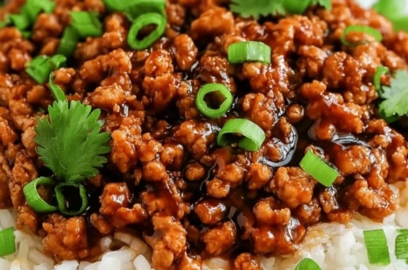 Honey garlic turkey dish garnished with green onions served on a plate