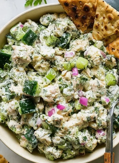 Delicious Tzatziki Chicken Salad served in a bowl with fresh vegetables