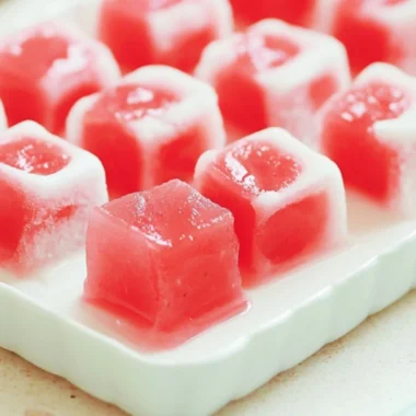 Delicious Watermelon Mochi dessert with a vibrant pink and green color scheme