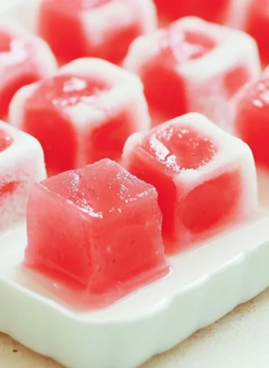 Delicious Watermelon Mochi dessert with a vibrant pink and green color scheme