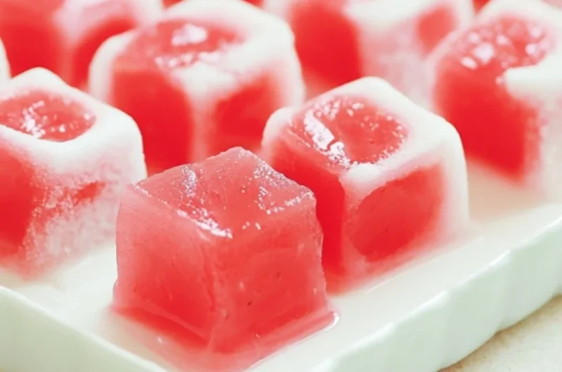 Delicious Watermelon Mochi dessert with a vibrant pink and green color scheme