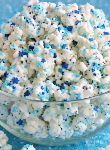 Winter Wonderland white chocolate popcorn drizzled with festive toppings
