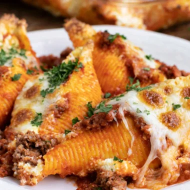 Delicious baked stuffed shells with creamy ricotta filling and sauce