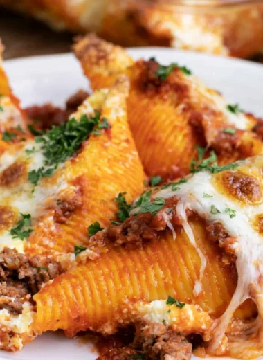Delicious baked stuffed shells with creamy ricotta filling and sauce