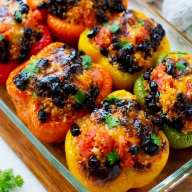 Delicious vegetarian stuffed peppers filled with grains and vegetables