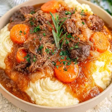 Delicious fall apple cider stew mash served in a rustic bowl with fresh herbs