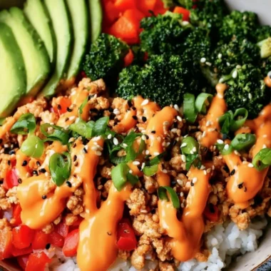 Easy Bang Bang Turkey bowls served in a bowl with fresh vegetables and sauces.